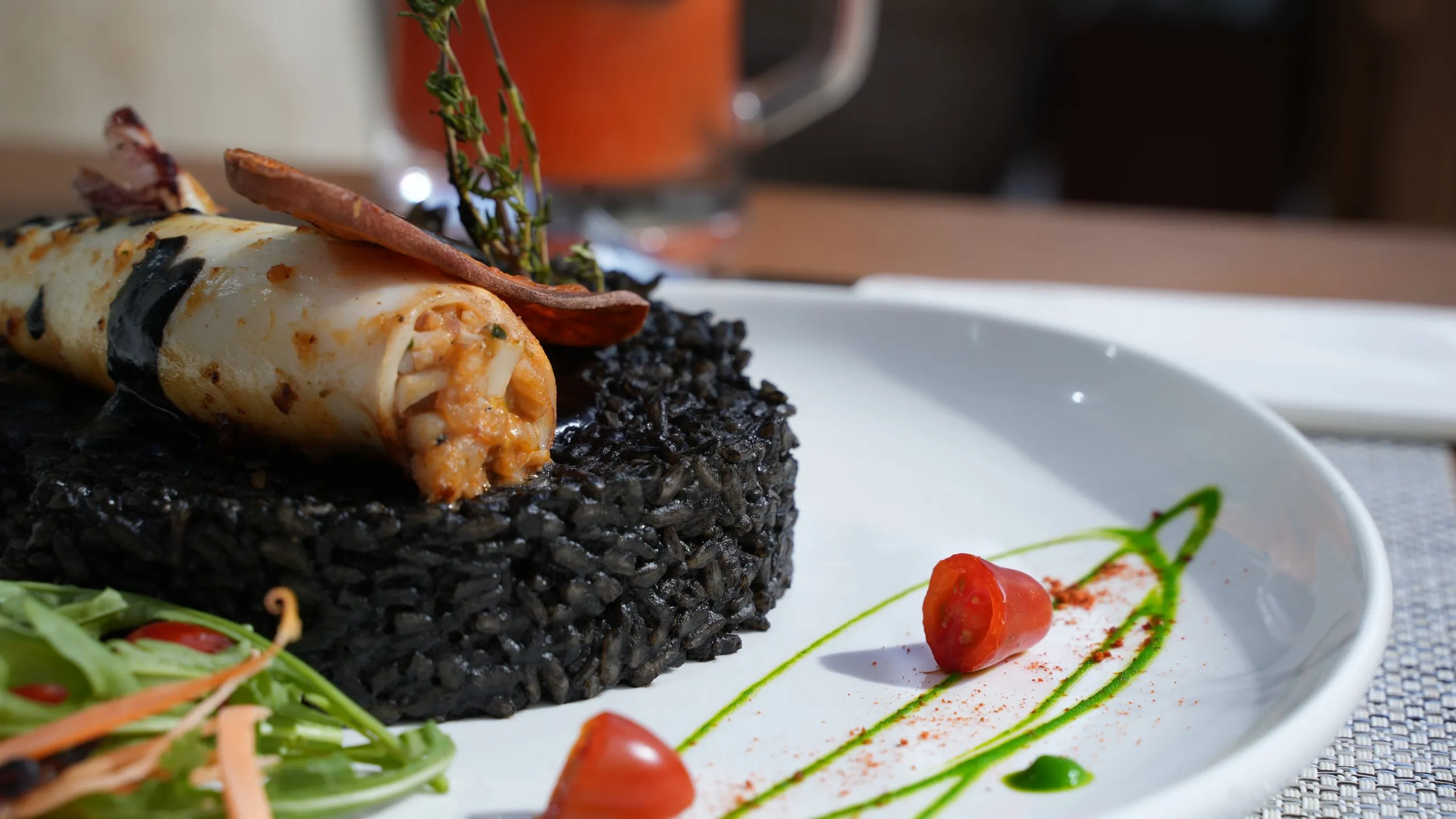 Stuffed squid served over black rice
