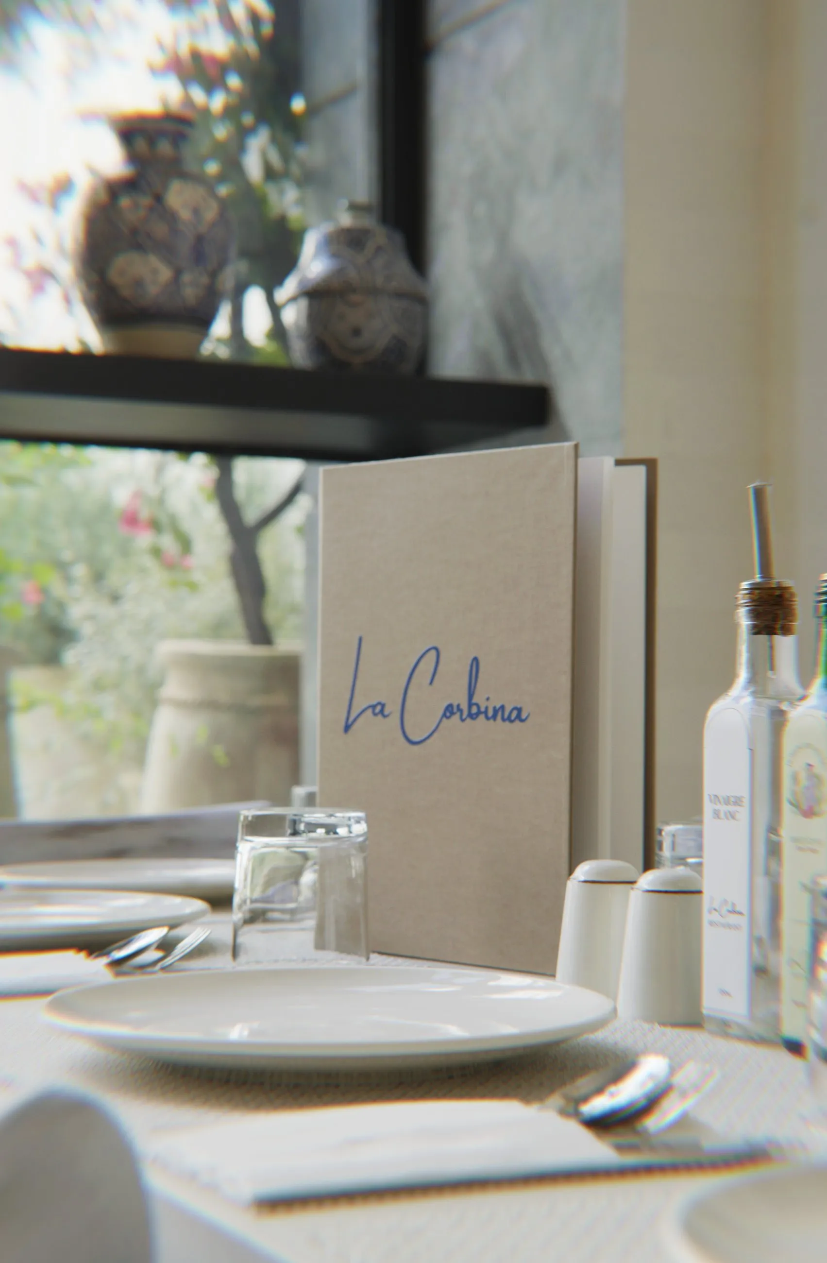 The La Corbina menu on a sunlit table