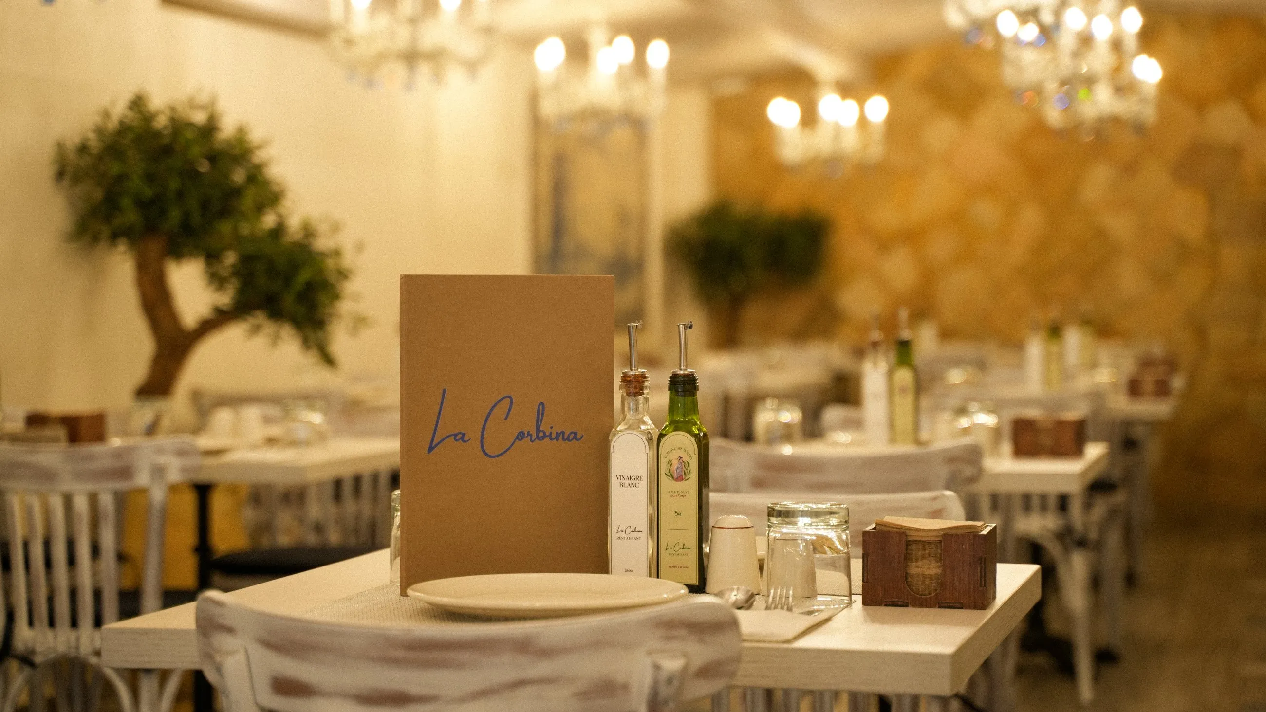 The La Corbina menu on a sunlit table