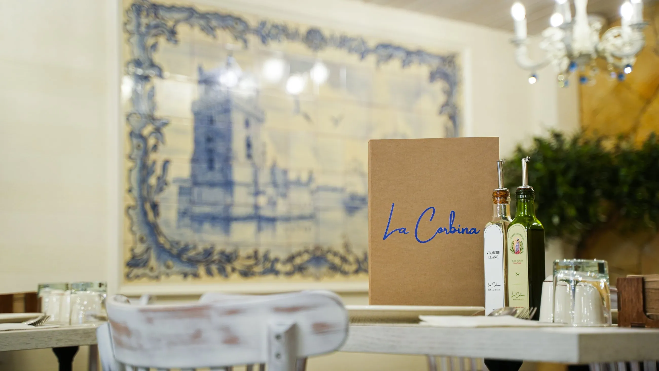 The dining room framed by blue and white azulejos